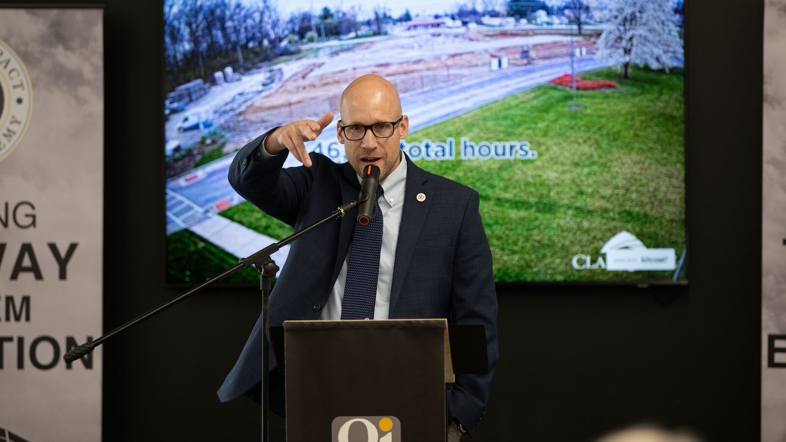 Josh Jennings, founding director of Global Impact Stem Academy addresses the crowd.