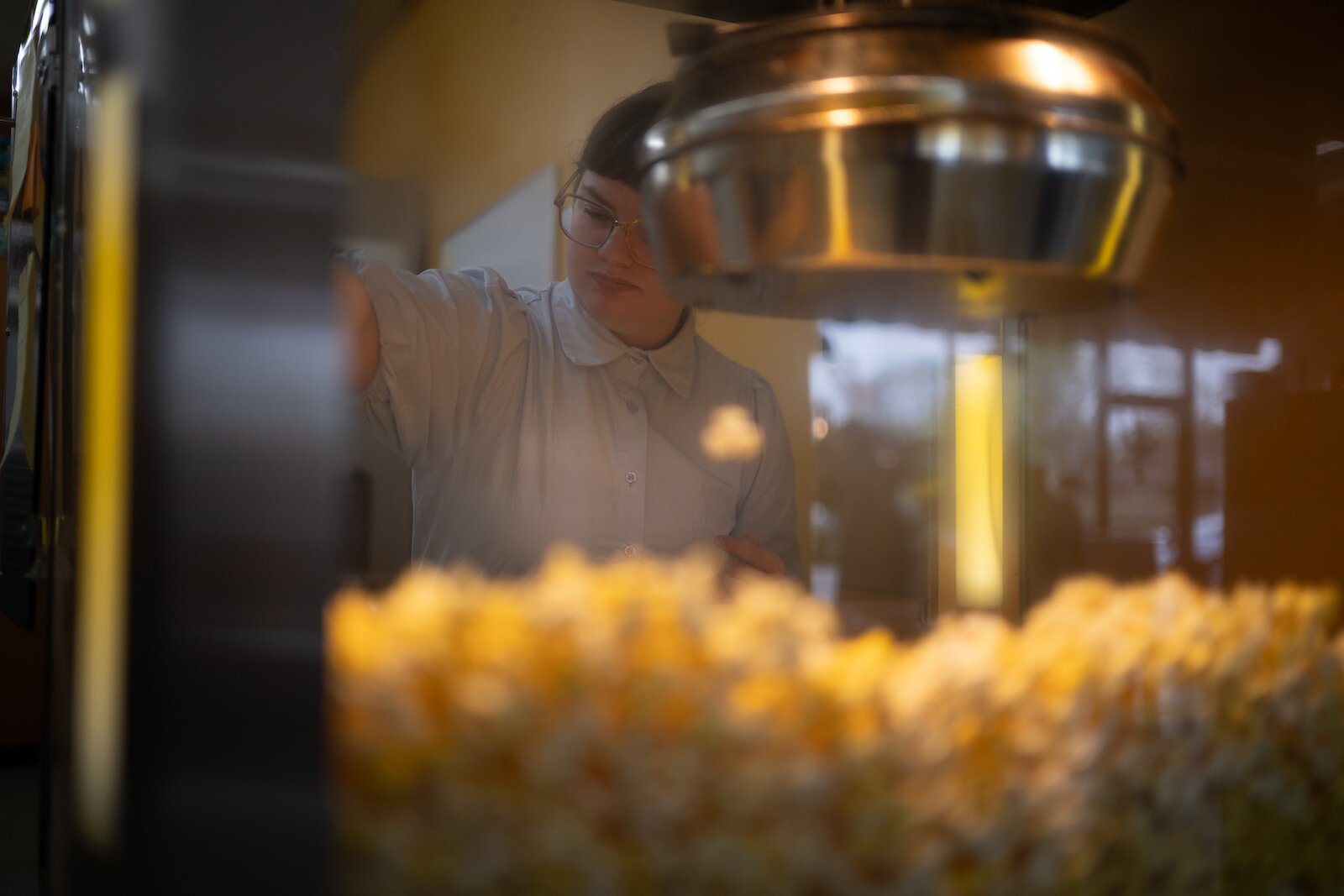 Madelene Kot making fresh popcorn at The Peanut Shoppe.
