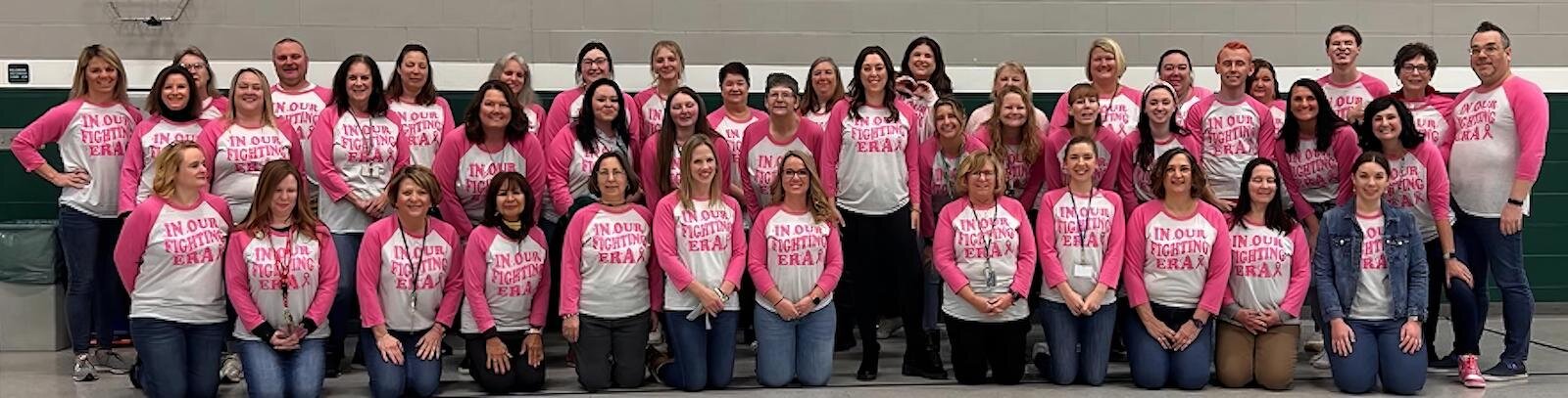 Staff supports teacher fighting breast cancer.