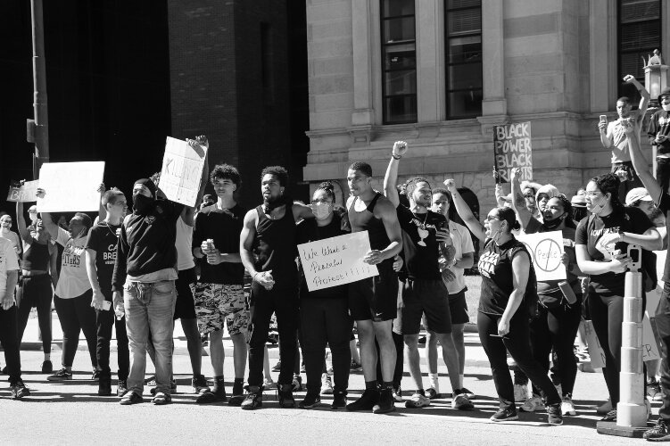 A protest in Downtown Springfield on Sunday remained peaceful while attendees pushed their message of racial equality.