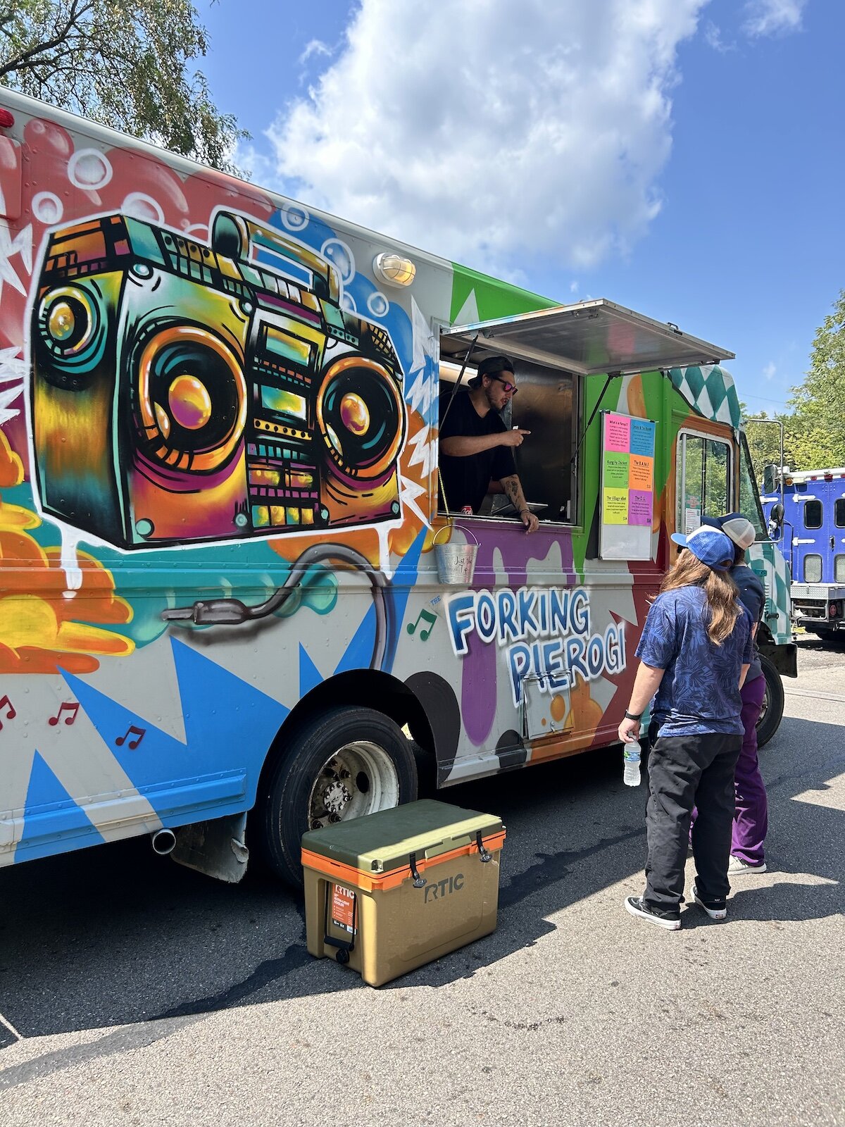 Customers order from Forking Pierogi's at the 2024 Rotary Gourmet Food Truck Competition.